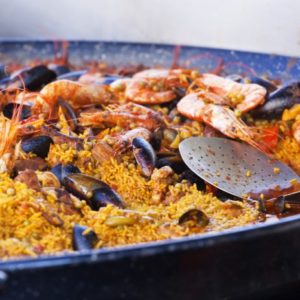 paella dish with seafood and rice